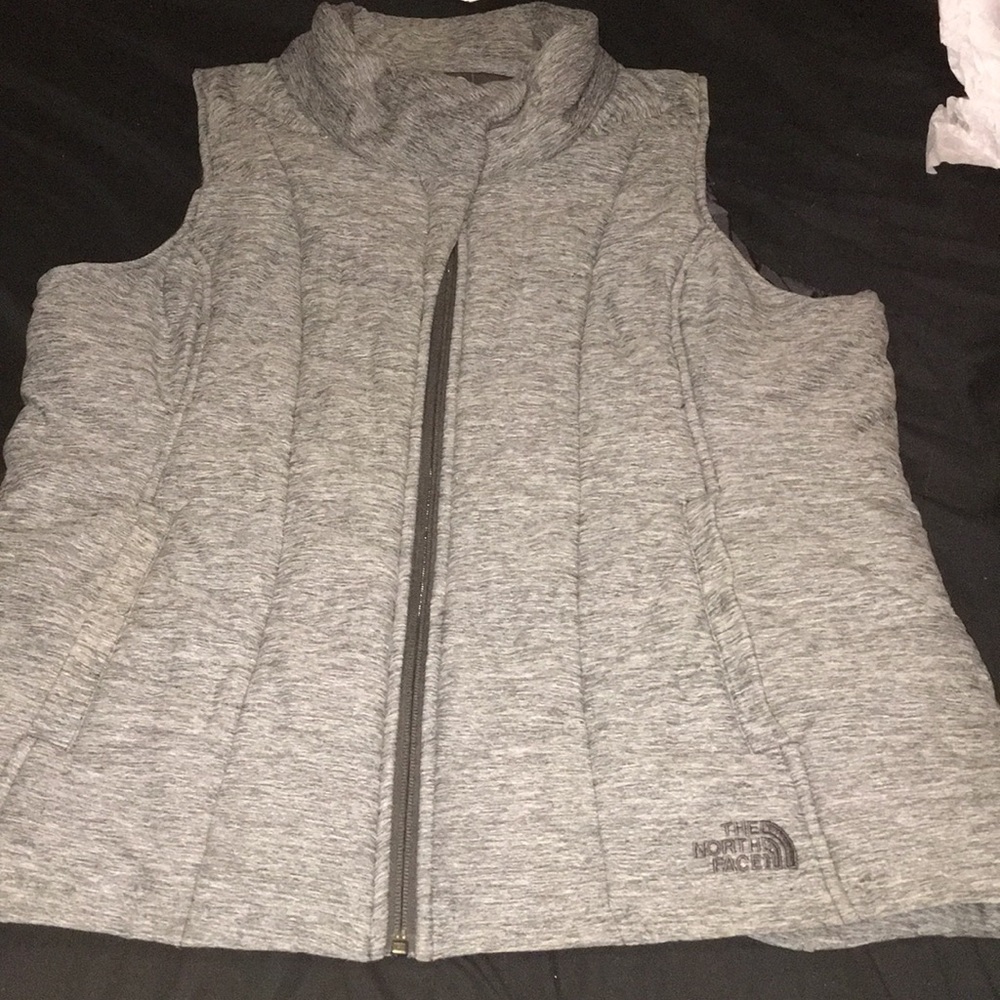 Grey north face vest, size XL but fits LARGE